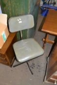 Vintage metal framed swivel chair