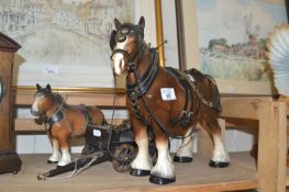 Two model shire horses and a cart