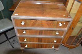 Walnut veneered four drawer chest