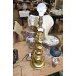 Modern Oriental table lamp together with a brass table lamp