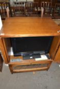 Modern oak television cabinet complete with Panasonic flat screen television