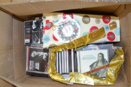 One box of mixed CDs
