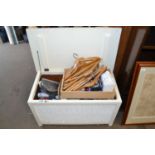 Ottoman containing various house clearance items