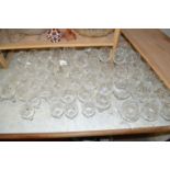 Large quantity of modern clear drinking glasses