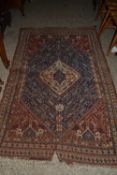 Antique Middle Eastern wool floor rug, 215cm long (a/f)