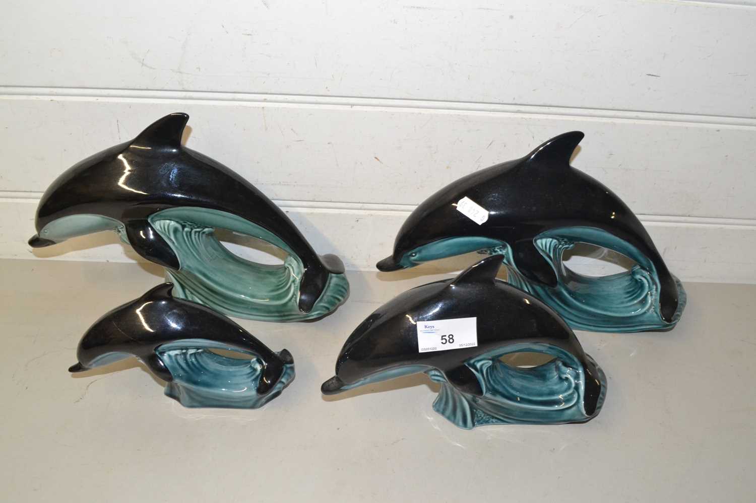 Four various Poole dolphins