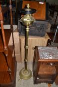 Brass oil lamp on stand