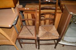 Rush seated ladder back chair and a further cane seated bedroom chair