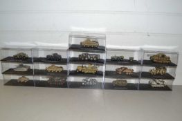 Collection of boxed model military vehicles