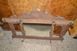 Late Victorian carved oak coat rack with central mirror