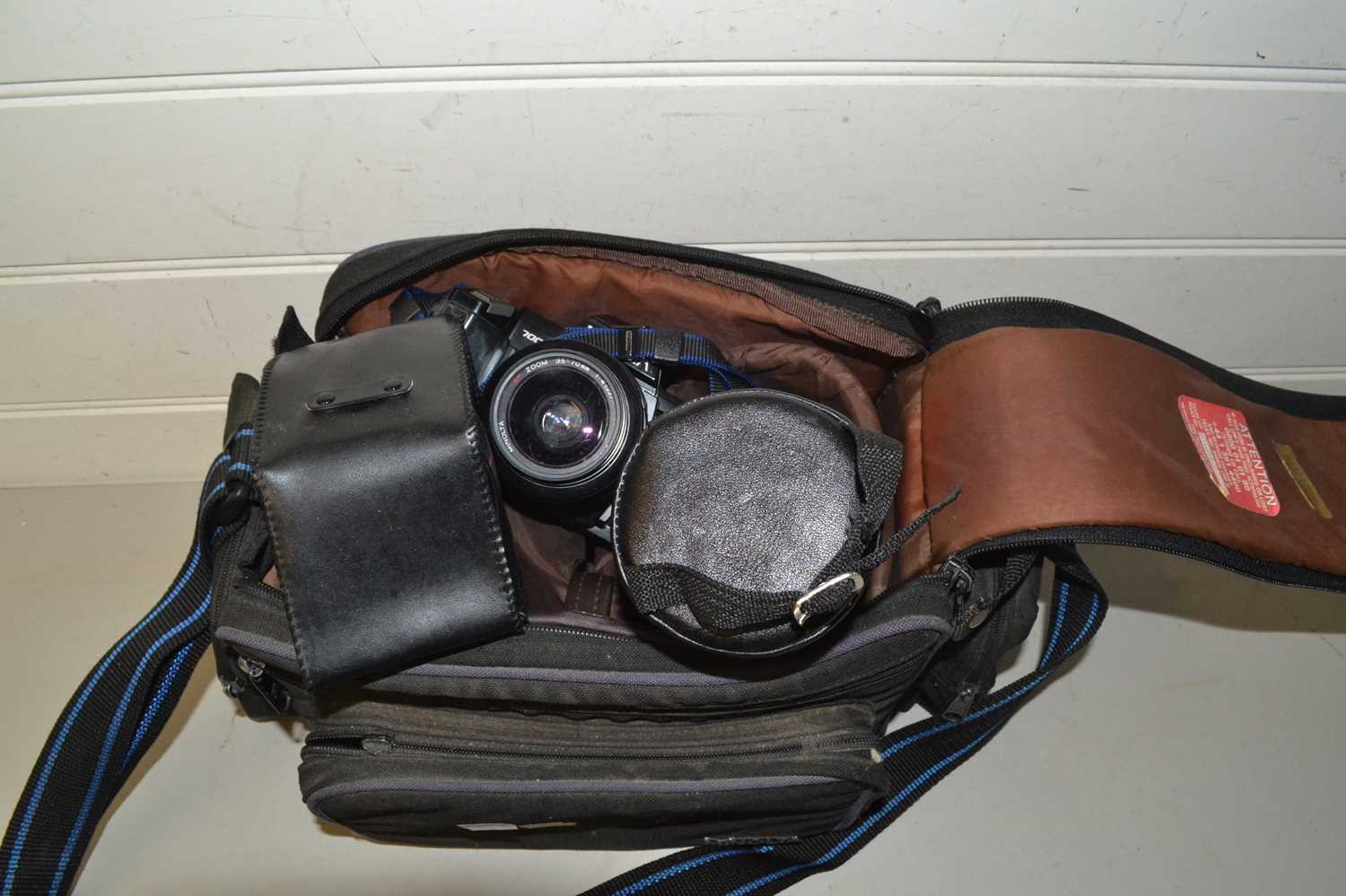 Camera bag containing a Minolta 7000 camera plus various lenses, accessories etc