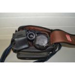 Camera bag containing a Minolta 7000 camera plus various lenses, accessories etc