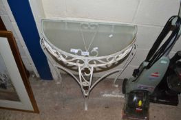 Metal framed and glass topped occasional table