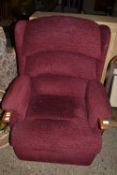 Red upholstered recliner chair