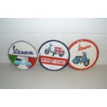 Three cast iron wall plaques for Vespa and Lambretta Scooters
