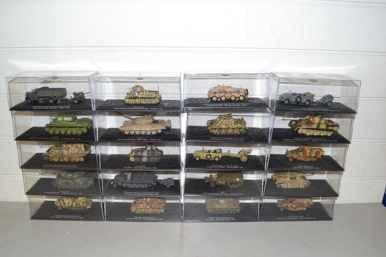 Collection of boxed toy military vehicles, tanks