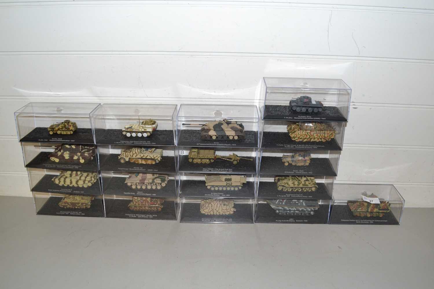 Collection of boxed military vehicles, mainly tanks