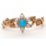 9ct gold turquoise and seed pearl cluster ring, the flower head raised between ornate pierced and