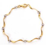 18ct gold and diamond bracelet, the S bar shaped links joined by small diamond set connectors,