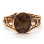 Antique oval moss agate ring, the oval agate in a cut down setting and raised between pierced