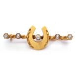 Antique horseshoe brooch, highlighted with old cut diamonds and two seed pearls, verso stamped 18,