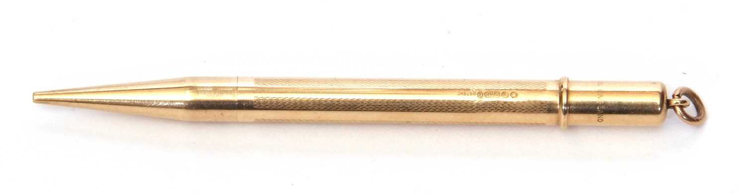 Vintage 9ct gold mechanical hallmarked pencil, the barrel engraved with a wavey line design and