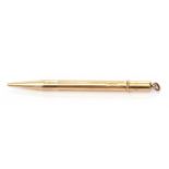 Vintage 9ct gold mechanical hallmarked pencil, the barrel engraved with a wavey line design and