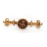 Early 20th Century 15ct stamped citrine brooch in etruscan style (a/f), 38mm long