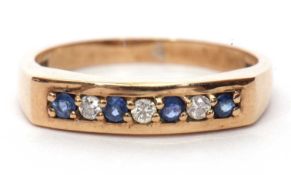 9ct gold sapphire and diamond ring, alternate chanel set with four round cut sapphires and three