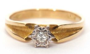 18ct gold single stone diamond ring having a small round brilliant cut diamond in an illusion