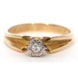 18ct gold single stone diamond ring having a small round brilliant cut diamond in an illusion