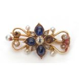 Sapphire, diamond and pearl brooch of open work design, the centre a flower head with an old cut