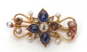 Sapphire, diamond and pearl brooch of open work design, the centre a flower head with an old cut