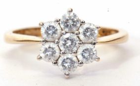 Cubic Zirconia cluster ring, a flower head design, stamped 585, size O