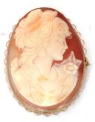 Large cameo brooch, the carved shell depicting a head and shoulders profile of a lady in a 9ct