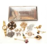 Mixed lot to include a chrome plated cigarette case, a ladies Timex wristwatch, brooches etc