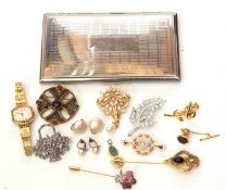 Mixed lot to include a chrome plated cigarette case, a ladies Timex wristwatch, brooches etc