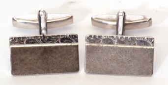 Pair of hallmarked silver and rhodium plated cufflinks, the rectangular panels with engine turned