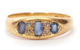 Victorian 18ct gold sapphire and diamond ring having three graduated oval cut sapphires