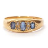 Victorian 18ct gold sapphire and diamond ring having three graduated oval cut sapphires