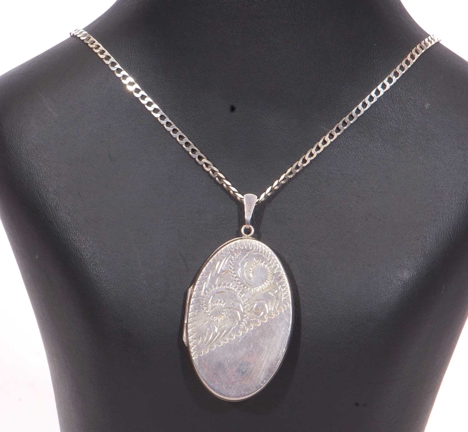 White metal oval locket, part chased and engraved with scrolls suspended from a 925 stamped chain - Image 2 of 6