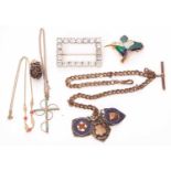 Mixed lot to include a paste set buckle, brooch, three silver fobs, a nut pendant etc