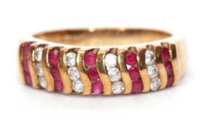 Modern 9ct gold cubic zirconia set ring, alternate design with bands of red stones and cubic