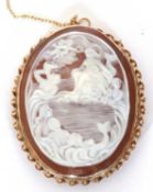 Oval shell cameo brooch carved with mermaids and cherubs, 46 x 32 mm, framed in a 9ct gold mount,