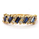 18ct gold sapphire and diamond ring alternate set with five rectangular cut sapphires and small