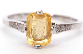9ct white gold citrine and diamond Intaglio ring, the cushion shaped citrine is 8 x 6mm and engraved