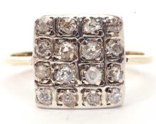 Diamond set plaque ring of oblong shape, 12 x 14mm set with sixteen graduated old cut diamonds,