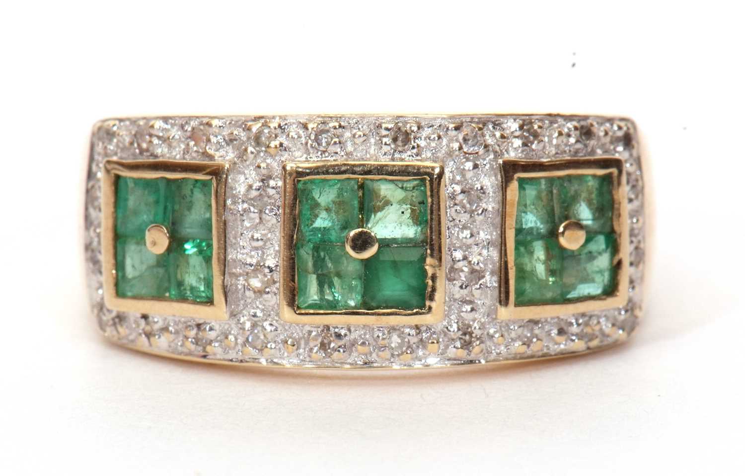 Modern 9ct gold emerald and diamond cluster ring, a design with three square panels made up of