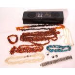 Mixed lot to include a Siamese white metal panel bracelet, matching ring and earrings, three amber