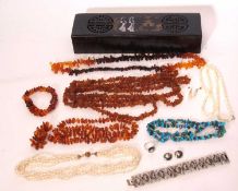 Mixed lot to include a Siamese white metal panel bracelet, matching ring and earrings, three amber
